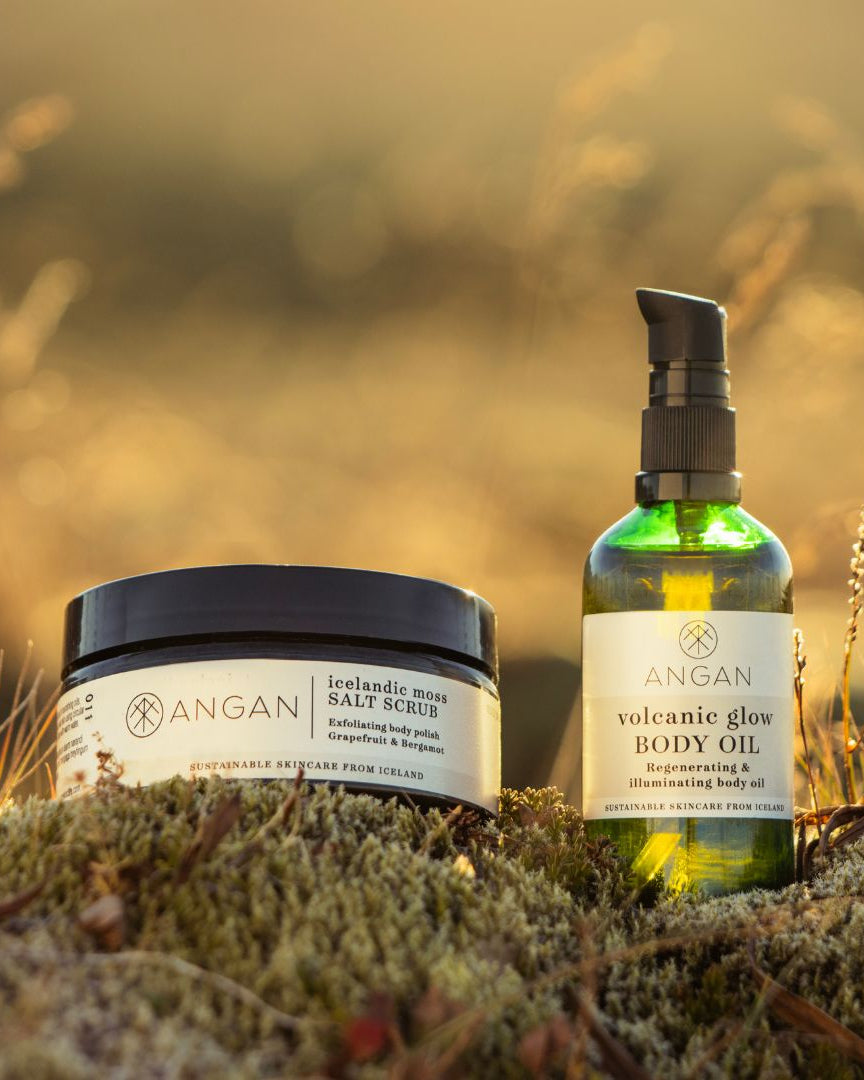 ANGAN Body Love Duo — lifestyle flat lay with Icelandic botanicals