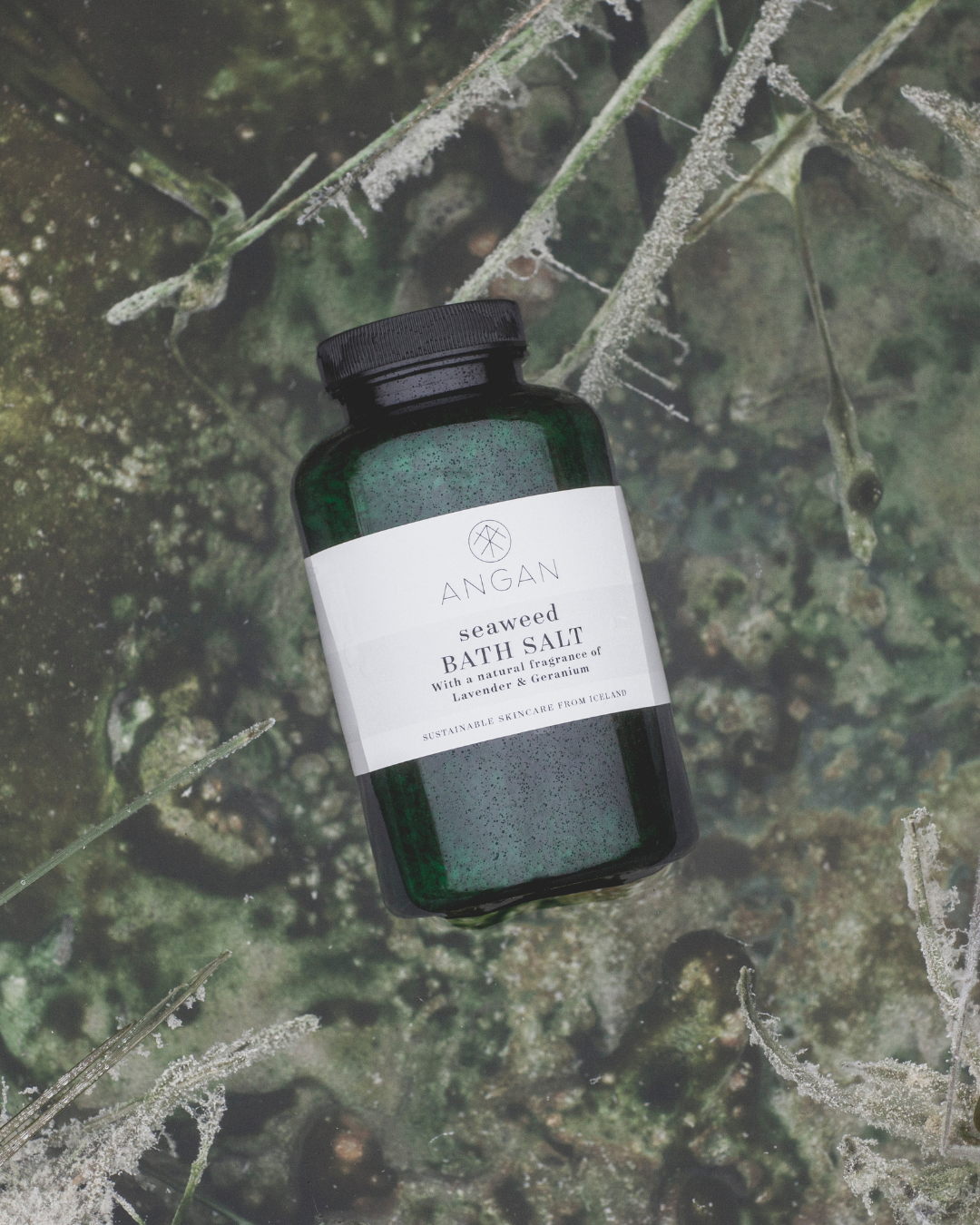 ANGAN Seaweed Bath Salt — lifestyle flat lay with botanicals