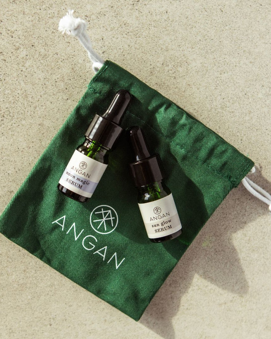 ANGAN Super Serums Discovery Set — lifestyle flat lay