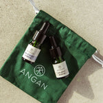 ANGAN Super Serums Discovery Set — lifestyle flat lay