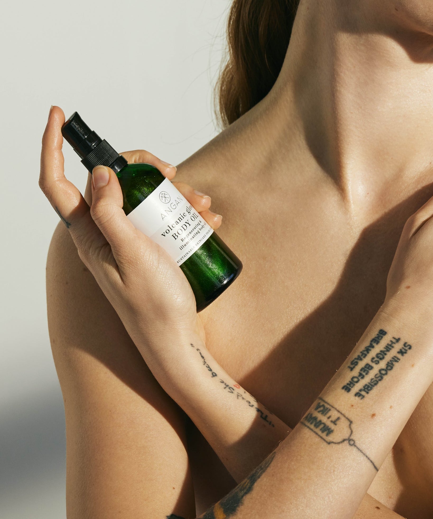 ANGAN Volcanic Glow Body Oil — 100ml glass bottle